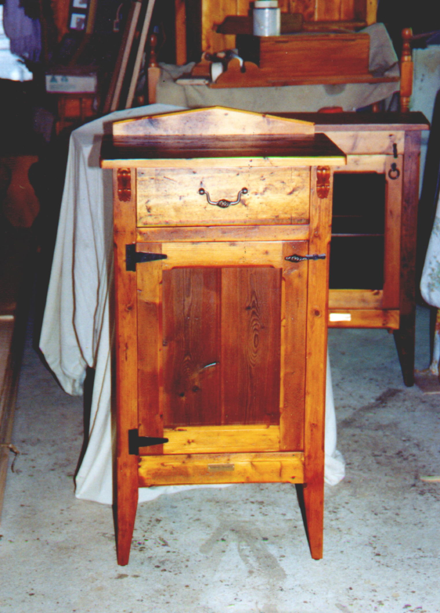 Rochester with drawer, angled backpiece, drop handle and small corbels $235