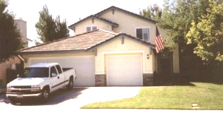 Front view of our home, and Geoffs truck-Home Sweet Home