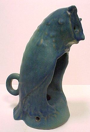 Early hand held owl candle holder