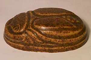 Early Scarab paperweight