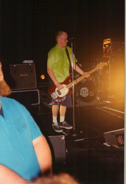 Yea, he may play the drums but he likes to look dumb playing the bass too.