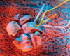 Broken mask on sand