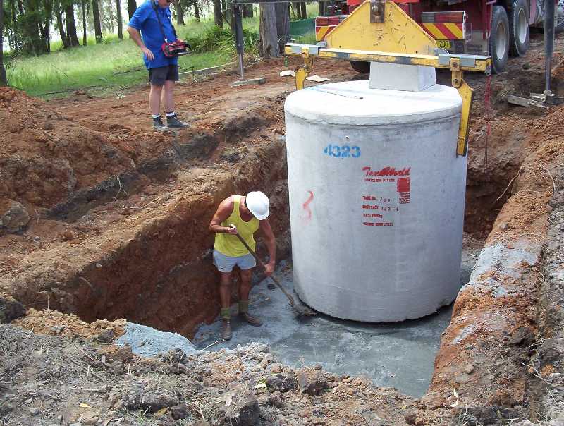 David in the trench levelling off the septic system ready for installation.