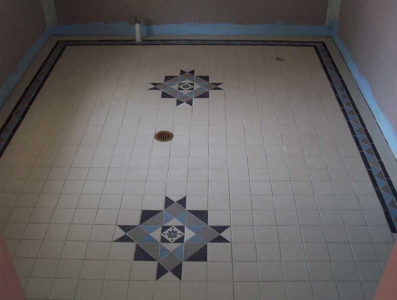 The White bathroom tiles.