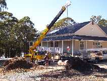 Jason the plumber, overseeing the installation of the Edwards solar hot water system.