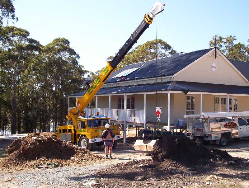 Jason the plumber, overseeing the installation of the Edwards solar hot water system.