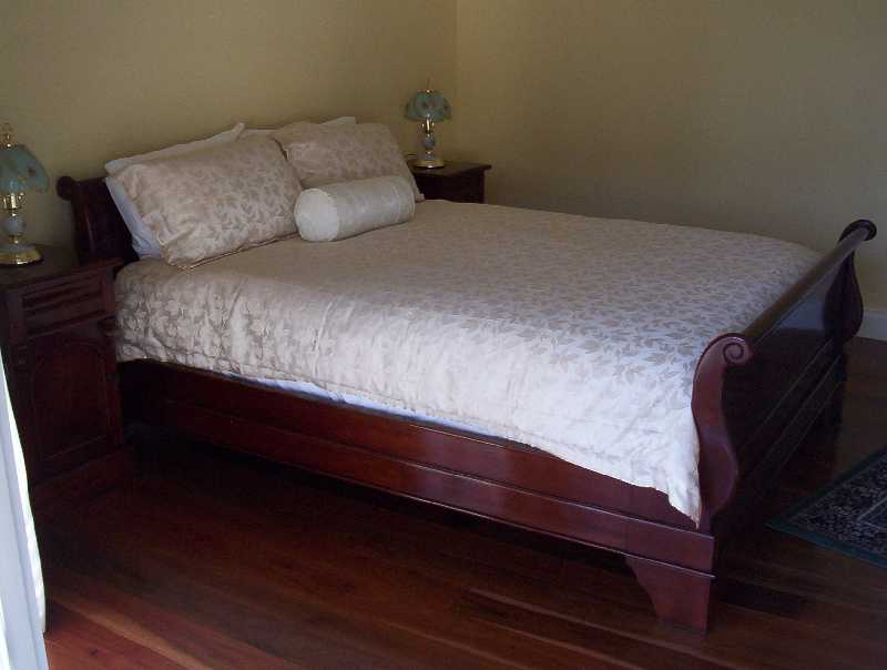 This beautiful queen size sleigh bed will charm any of our guests.