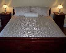 This beautiful queen size sleigh bed will charm any of our guests.