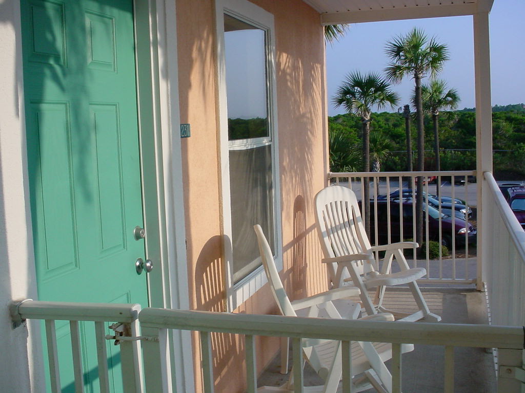 This is the private gated porch overlooking the pool. It is shaded 80% of the day. The Gerrell Gulf View condo has it all!