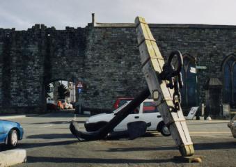 Caernarfon's city wall and an anchor from a Napoleonic War era ship-of-the-line