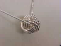 The Mobius Pendant Necklace with Matching Earrings