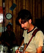 John hard at work playin'