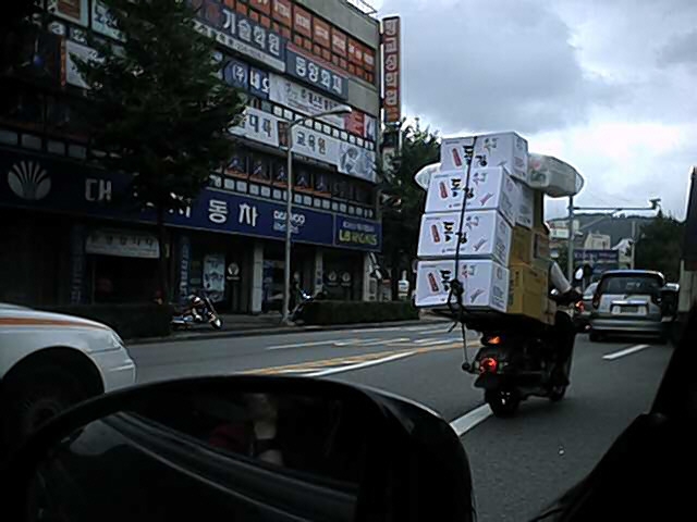 How much can a Korean fit on a motorcycle??&nbsp; Up to 7 people!!