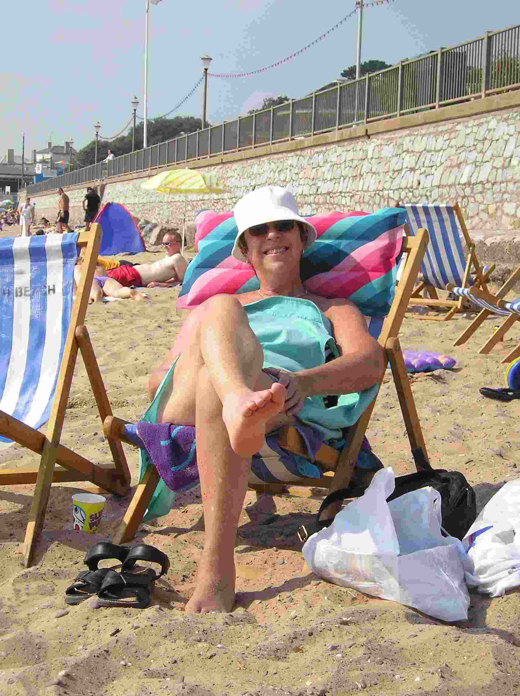 Carolle's millinery and beach-cushion set new standards of beach couture for the Ravenscroft Singers!