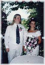 [Graham and Nikki retake their vows in a beach gazebo]
