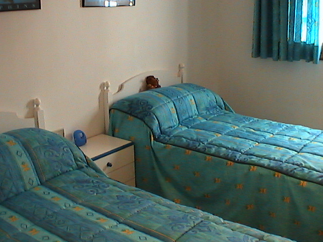 The apartment has one bedroom with two single beds.&nbsp; The living room has a sofa which converts to a double bed.