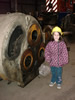 Next to an engine part.