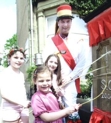 Squire & Girls Beat a Boundary Post