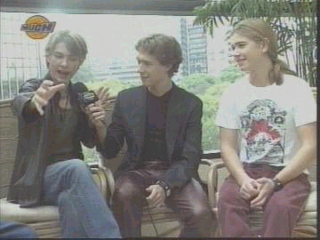 OH WAIT! THIS IS A CROSS LEGGED PICCIE! WOOOO!!! YES! PROOF! I'm really starting to question his *Standing*