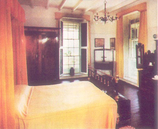 One of the numerous bedrooms in the great house, maintained today as it was hundreds of years ago.