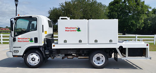 A pest control service truck