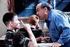 As Private Melvin with Mark Wahlberg as Private Tommy Lee Haywood and Danny DeVito as Bill Rago