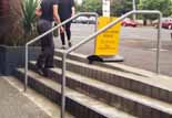 Folks using the dangerous steps.  They are quite safe when dry.

Click this picture to see a larger photo.