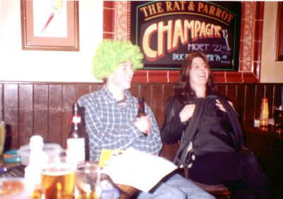 Pilgrim drinking another Bud talking to his G/F
