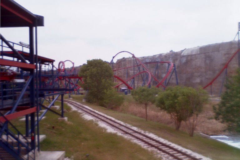 [Wide shot of coaster]