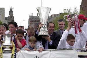 Liverpool display their trophies to the City.
