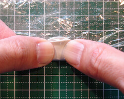 Kneading metal clay.
