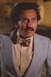 Nadim Sawalha as Aziz Fekkesh