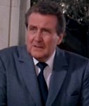 Patrick MacNee as Sir Godfrey Tibbett