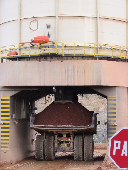 And here we can see how the truck receives the raw material from a huge cilinder.