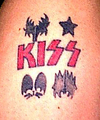 My Tattoo - it's on my right upper arm...I got the red logo done in 1994 and the black symbols added in 1997