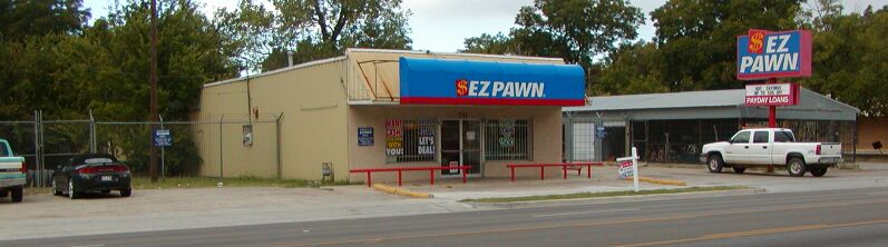 Vacant Lot, Pawn Shop & Storage Sheds
