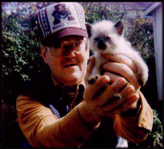 Brain and his pet cat "Dean Smith".&nbsp; Brian likes to write write poetry and play boardgames too.