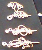 Some Copper Barrettes