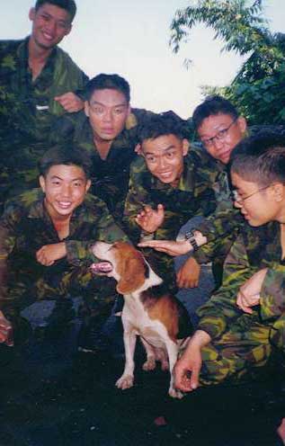 Posing with the dog.