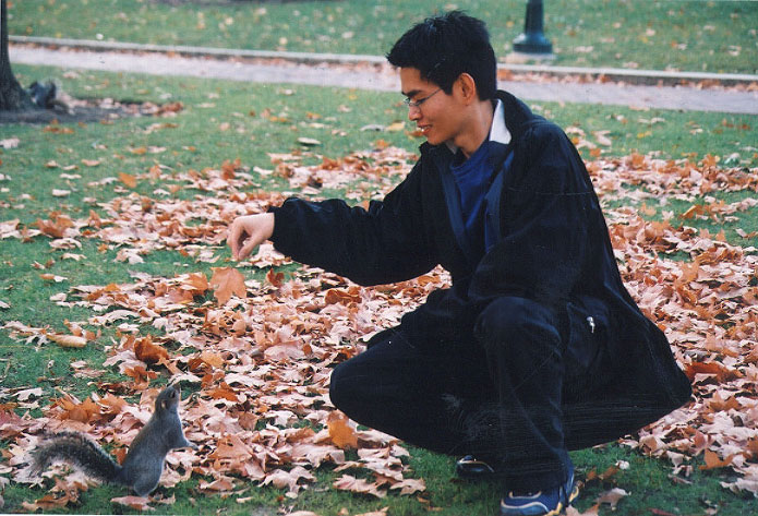 Kelvin trying to trick the squirrel using a leaf