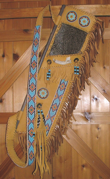 Quiver with rattlesnake bead pattern.