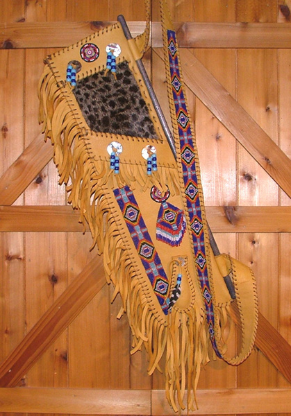 Quiver with rattlesnake bead pattern.