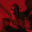 Zombie lit by red light
