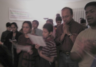 Devotees singing Dhoop Arti to Saibaba