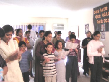 Devotees singing Shej Arti to Saibaba