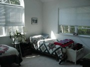 Twin Bedroom with Shared Bathroom