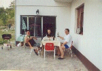 Welcome barbeque. Dad & neighbour are eating, mum has to cook