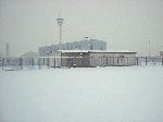 First snow only lasted short; in the background:  the blue building formerly known as the blue factory or norwegian hospital