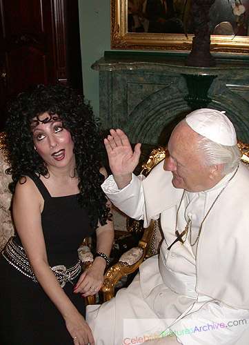 Is her hand on the pontiff's thigh?