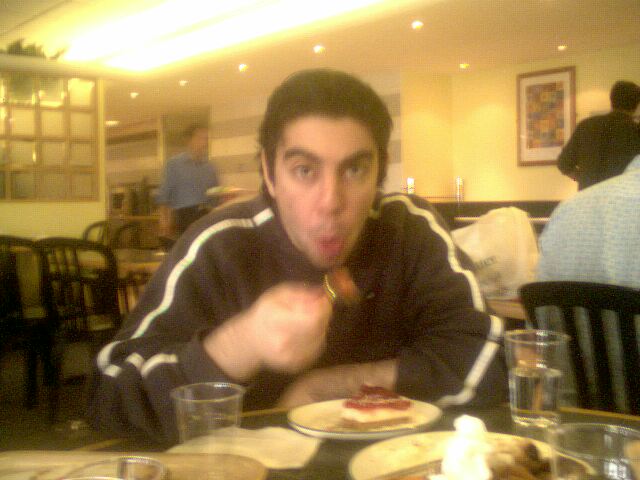 Dj&nbsp; Andre eating his cheesecake at roots